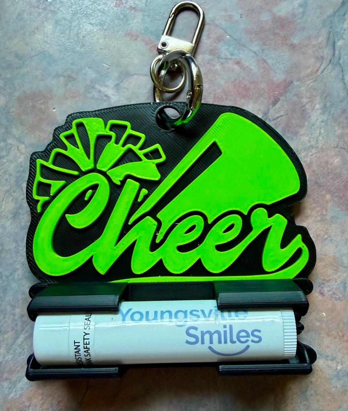 Cheer chap stick/hair tie holder